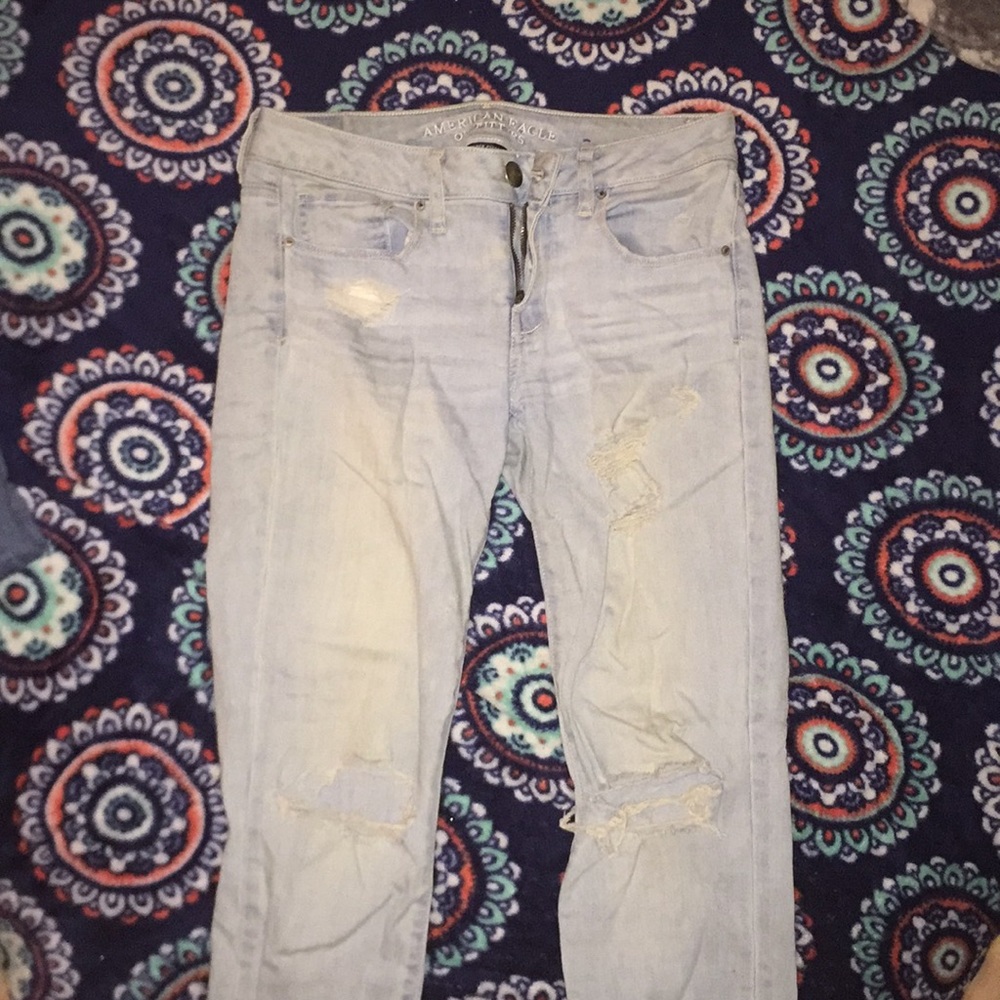 Light Blue Jeans with holes